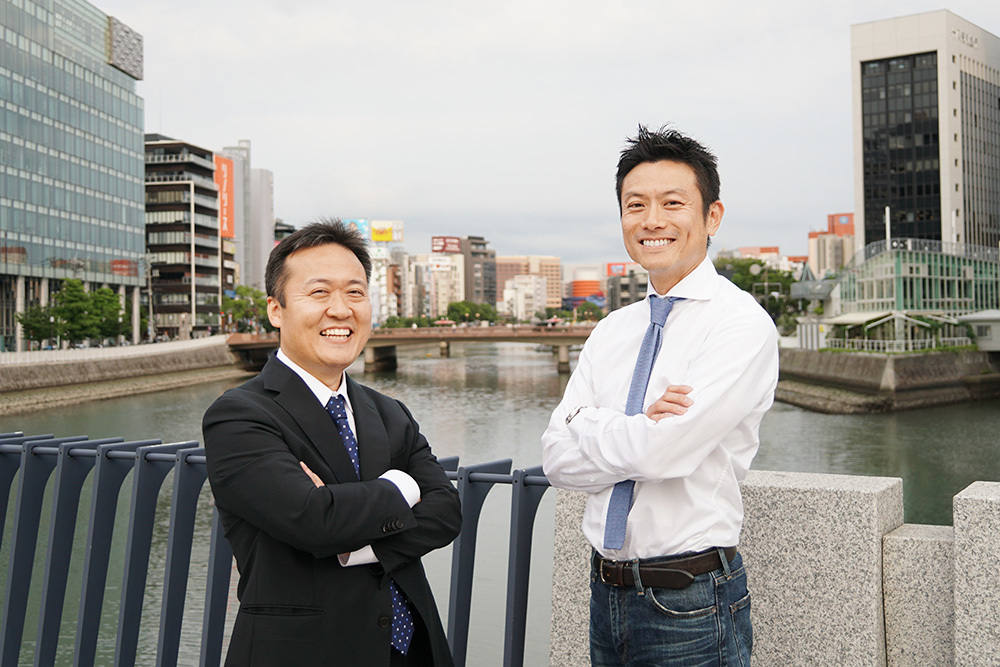 電通岸本MD(左)とFusic納富社長(右)