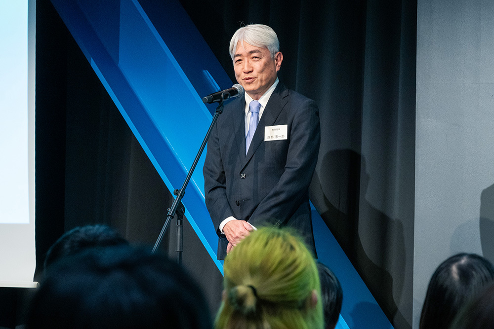 あいさつするACジャパン 西部憲一郎 専務理事