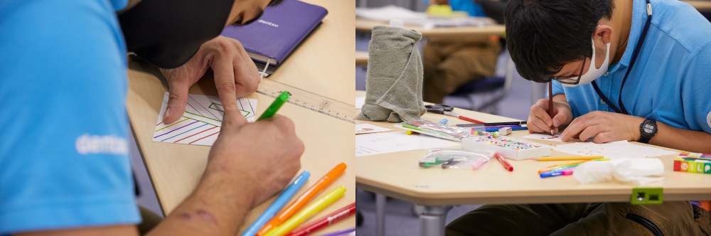 カレンダーの数字を手描きする電通そらりのスタッフ