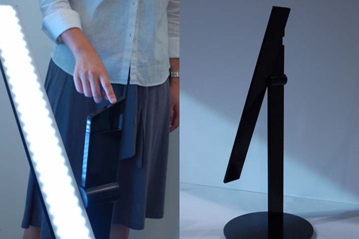 写真左のキューブを動かすと、ネットワークでつながったランプが点灯する。自分の好みの明るさ、位置を記録できる (Moodmark)-2